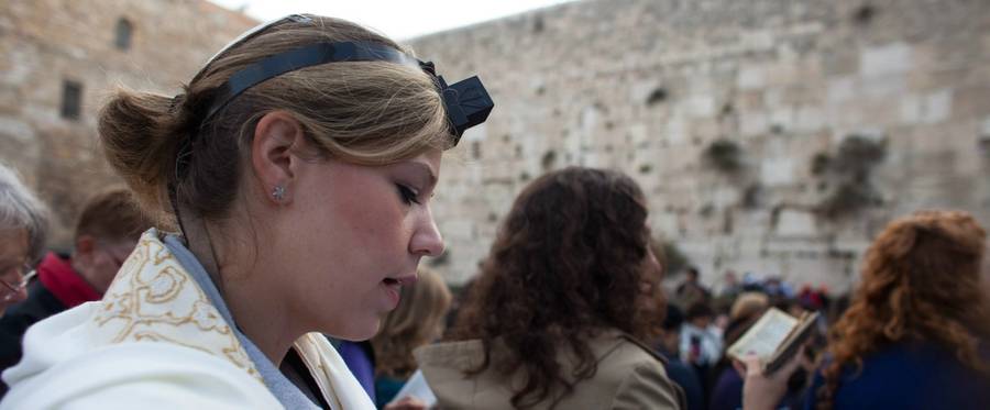 A member of 'Women of the Wall' wearing tefilin and a tallis at the Kotel on April 11, 2013.