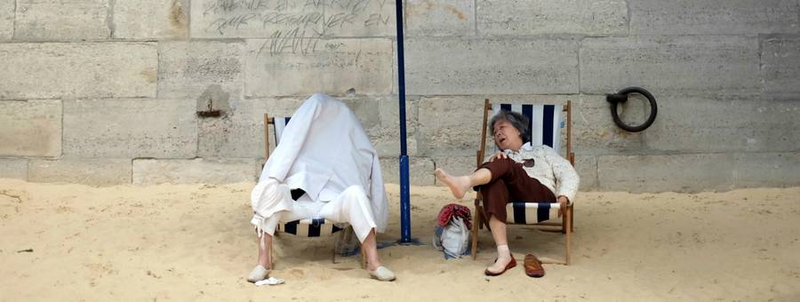 People relax on the sand during the 'Paris Plage' (Paris Beach) event on the banks of the river Seine in Paris, France, July 29, 2015. 