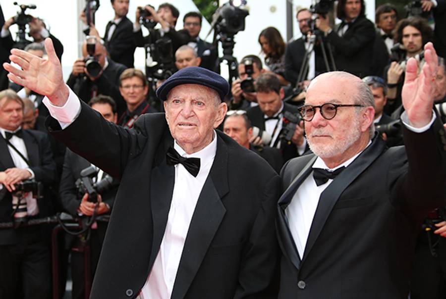 Israeli producers Menahem Golan (L) and Yoram Globus at the 67th Cannes Film Festival in Cannes, southern France, on May 16, 2014. (LOIC VENANCE/AFP/Getty Images)