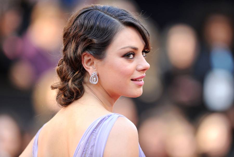 Actress Mila Kunis arrives at the 83rd Annual Academy Awards held at the Kodak Theatre on February 27, 2011 in Hollywood, California. (Jason Merritt/Getty Images)