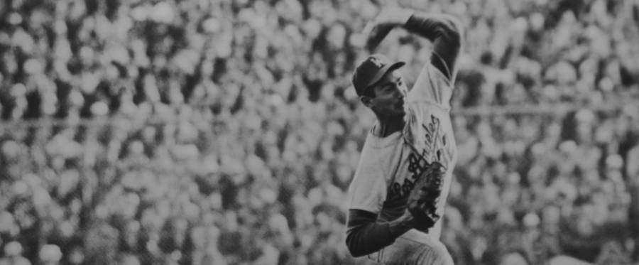 Sandy Koufax pitches a 2-0 shutout in Game 7 of the World Series, The Dodgers vs. The Twins, in Minneapolis, Minnesota, on October 14, 1965. The Los Angeles Dodges won the series, and Koufax was awarded the M.V.P. trophy.