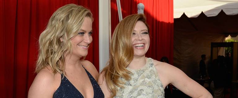 Actresses Amy Poehler (L) and Natasha Lyonne attend the 21st Annual Screen Actors Guild Awards at The Shrine Auditorium in Los Angeles, California, January 25, 2015. 