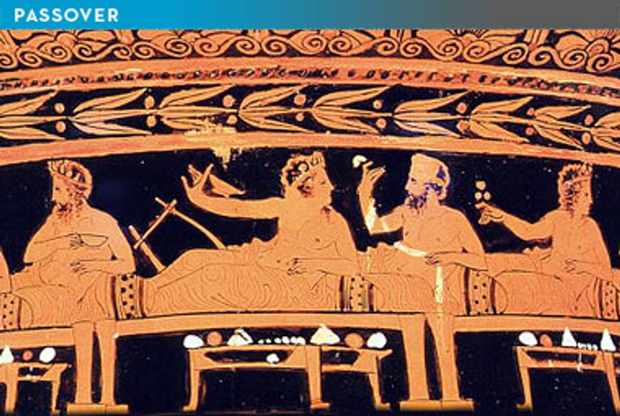 An ancient Greek symposium scene, depicted on a 390 BCE vessel on display at the J. Paul Getty Museum in Los Angeles.(-/AFP/Getty Images)