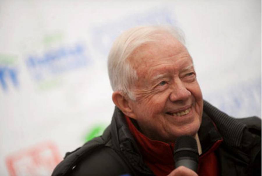 President Carter in China last month. His grandson also has the political bug.(STR/AFP/Getty Images)