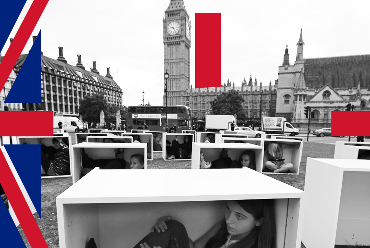 Volunteers sit in boxes in Parliament Square to represent conditions inside Gaza August 14, 2014 in London.(Peter Macdiarmid/Getty Images)