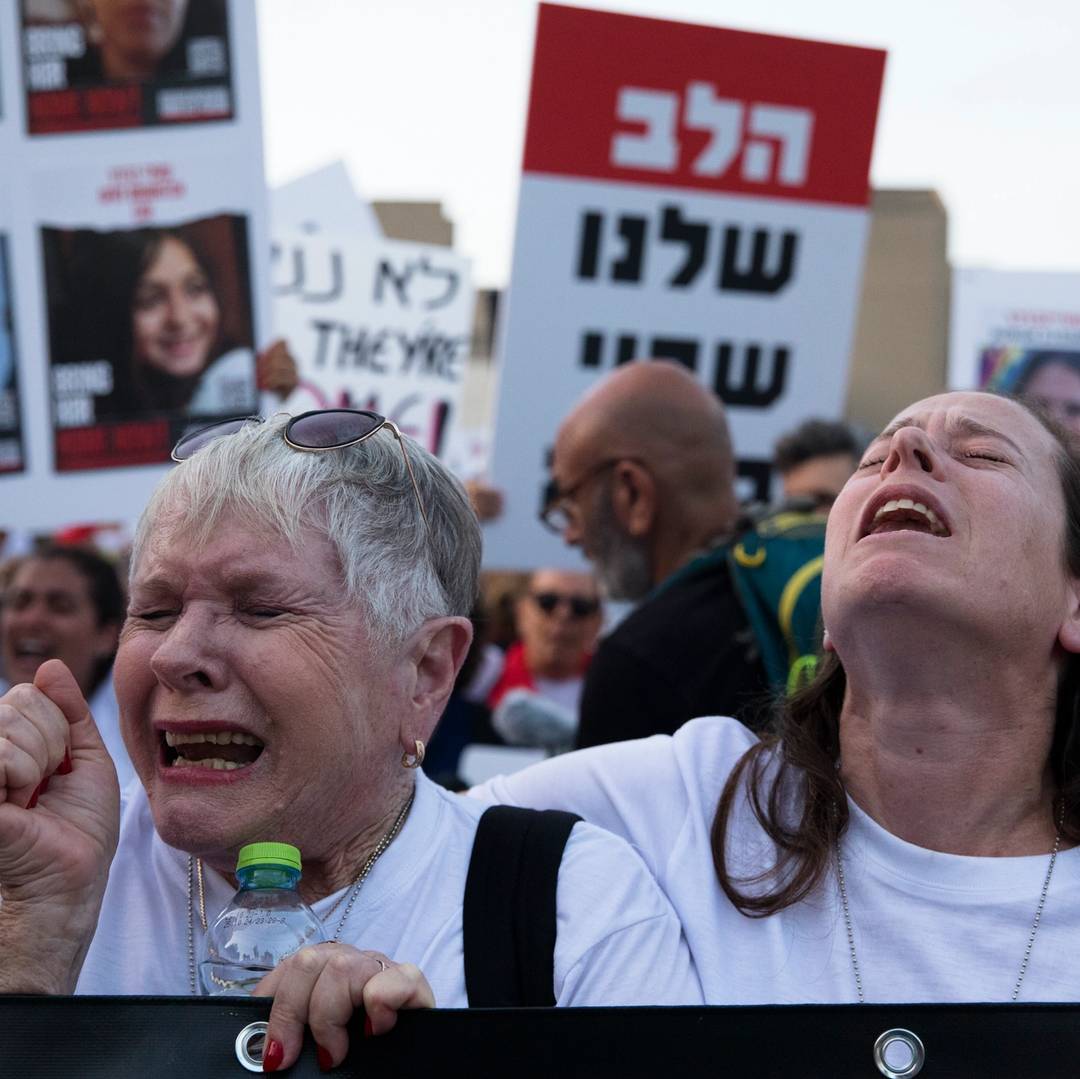 Family and friends of hostages taken from Kfar Aza demonstrate in the Tel Aviv Museum plaza, Nov. 2, 2023