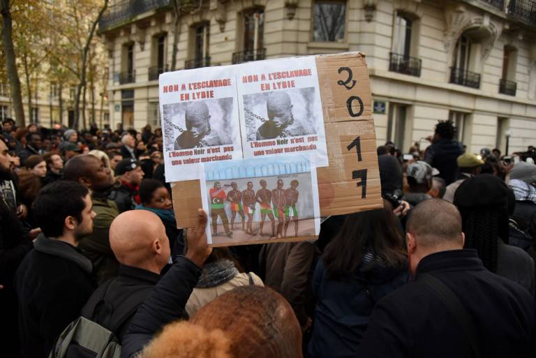 A protest against slavery in Libya in front of the Libyan Embassy in Paris, 2017