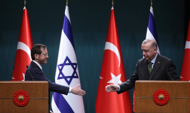 Israeli President Isaac Herzog, at left, and Turkish President Recep Tayyip Erdogan hold a press conference in Ankara on March 9, 2022