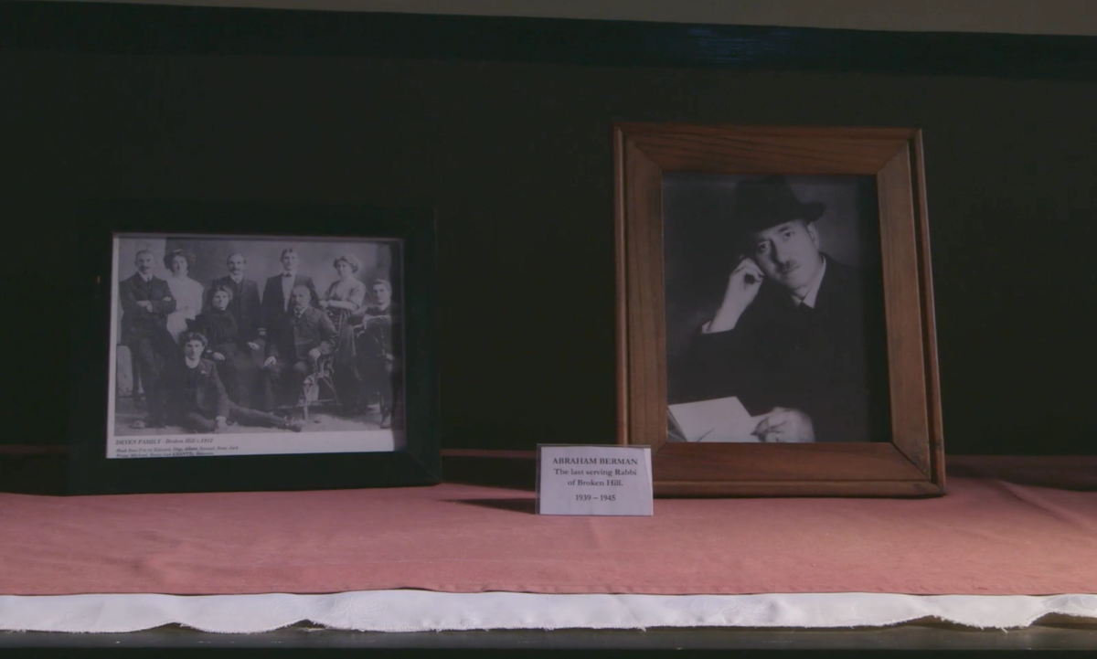 Photos on display at the Broken Hill Historical Society, including a portrait of Abraham Berman, the synagogue's last serving rabbi