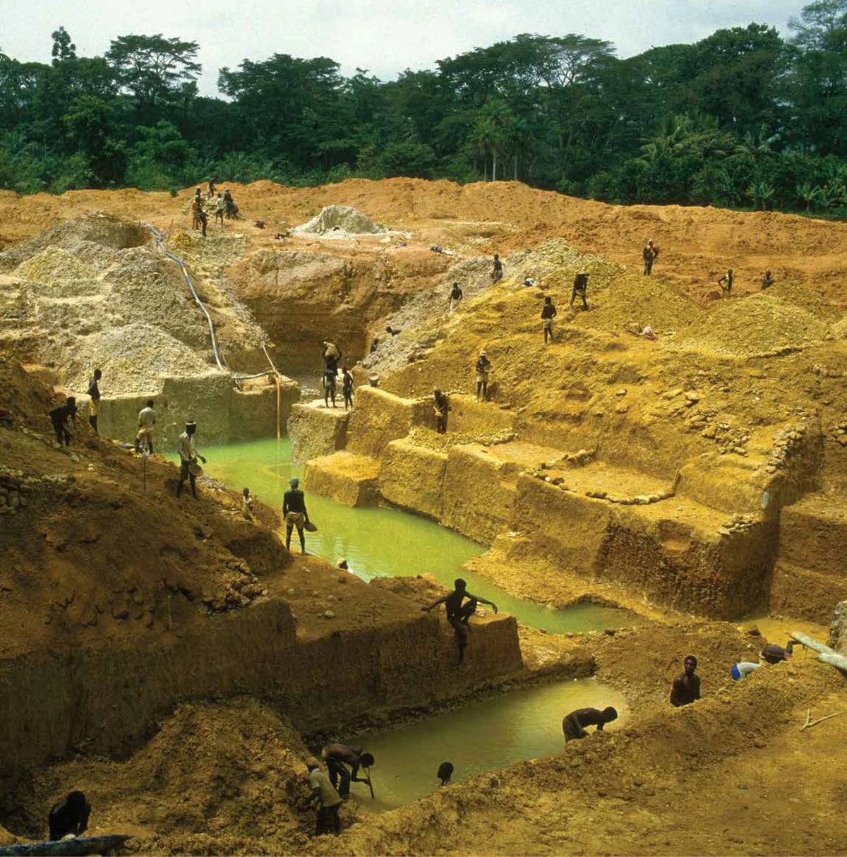 Sierra Leone produced 457,000 carats of gem diamond in 2014, feeding an $80 billion world market. Shown here is small-scale mining in the Kono region, 2005.