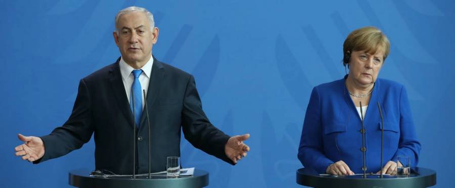 German Chancellor Angela Merkel and Israeli Prime Minister Benjamin Netanyahu speak to the media during a visit by Netanyahu at the Chancellery on June 4, 2018, in Berlin.
