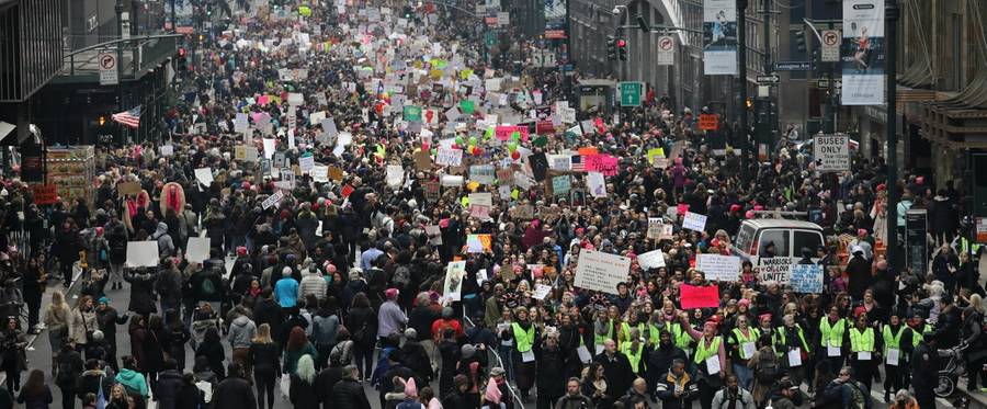 Thousands of people walk on 42nd Street while taking part in the Women's March on January 21, 2017 in New York City. 