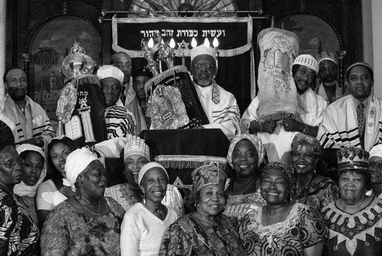 Rabbi Hailu Paris with his congregation at Beth Shalom in Brooklyn, N.Y. (© Chester Higgins Jr)