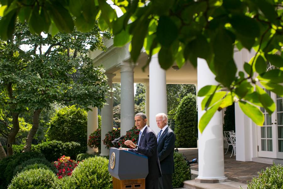 U.S. President Barack Obama, joined by Vice President Joe Biden, delivers a statement on Syria in the Rose Garden of the White House on Aug. 31, 2013.(Kristoffer Tripplaar-Pool/Getty Images)