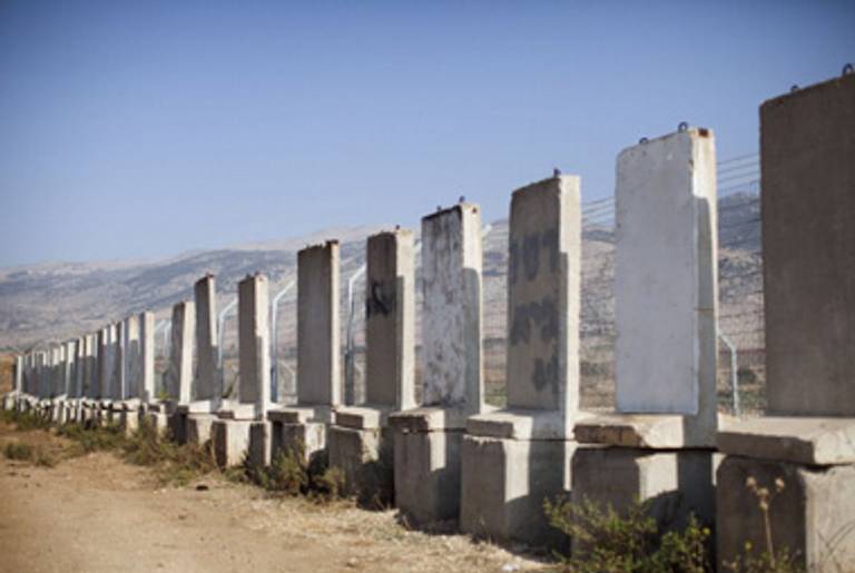 Concrete barriers at the entrance to a village on the Israeli-Lebanese border.(Uriel Sinai/Getty Images)