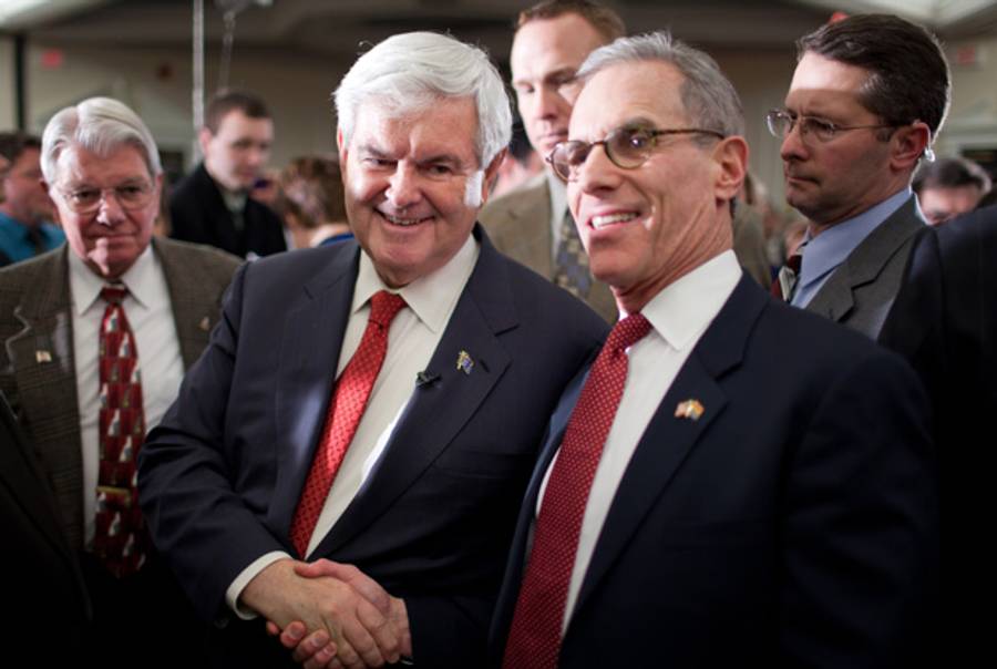 Newt Gingrich with Fred Karger in January.(Photo by Matthew Cavanaugh/Getty Images)