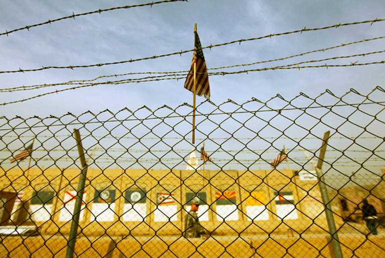 An American flag flies at the former Sather Air Base in Baghdad in December 2011, shortly before the departure of the remaining American troops from Iraq.(Mario Tama/Getty Images)
