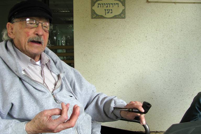 Holocaust survivor Moshe Rute, a resident at Hadarim nursing home, where he smokes cannabis daily to fight chronic pain.(Shira Rubin)