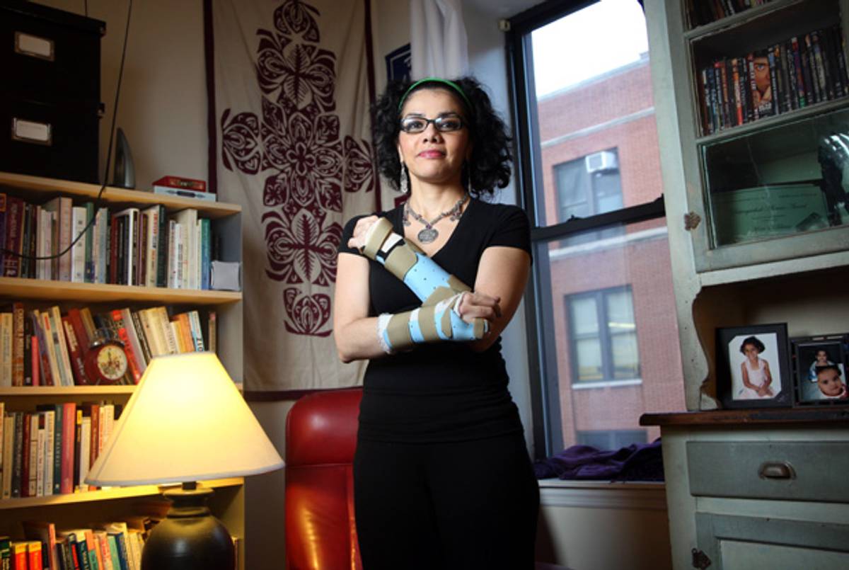 In November 2011, Mona Eltahawy was assaulted by Egyptian security officials, who fractured her wrists. She told her story in a series of tweets at the time of her arrest and after her release. (Dan Callister/Rex Features via AP Images)