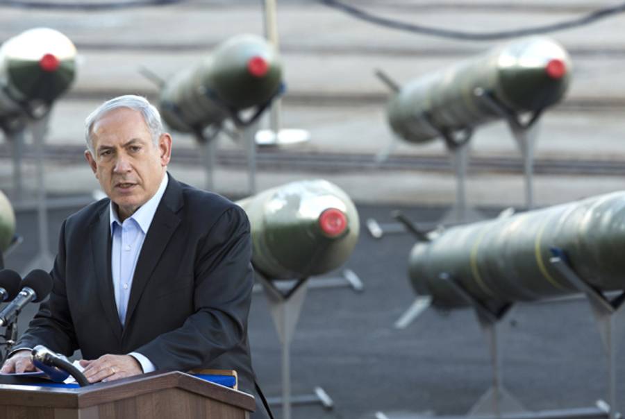 Israeli Prime Minister Benjamin Netanyahu speaks to the press at southern Israeli port of Eilat, on March 10, 2014, as Israel displayed advanced rockets type M-302 capable of reaching distances of up to 200 km that were unloaded from the Panamanian-flagged Klos-C vessel on March 9, 2014 in the southern Israeli port of Eilat. (JACK GUEZ/AFP/Getty Images)