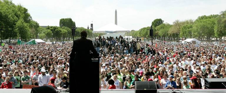 Thousands of protesters join 'Save Darfur' rally at the National Mall calling to stop genocide in the Darfur region of Sudan April 30, 2006 in Washington, DC. 