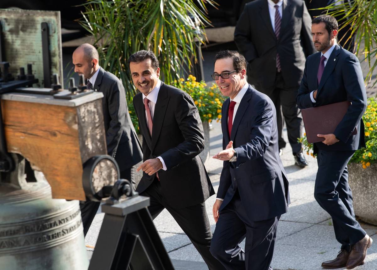 Treasury Secretary Steve Mnuchin greets the emir of Qatar, Sheikh Tamim bin Hamad Al Thani at the Treasury Department for a dinner with President Donald Trump in Washington, D.C., on July 8, 2019