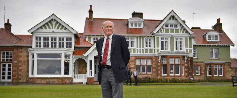 enry Fairweather, chair of Muirfield Golf Club poses in front of the clubhouse in Gullane, Scotland, May 19, 2016. 