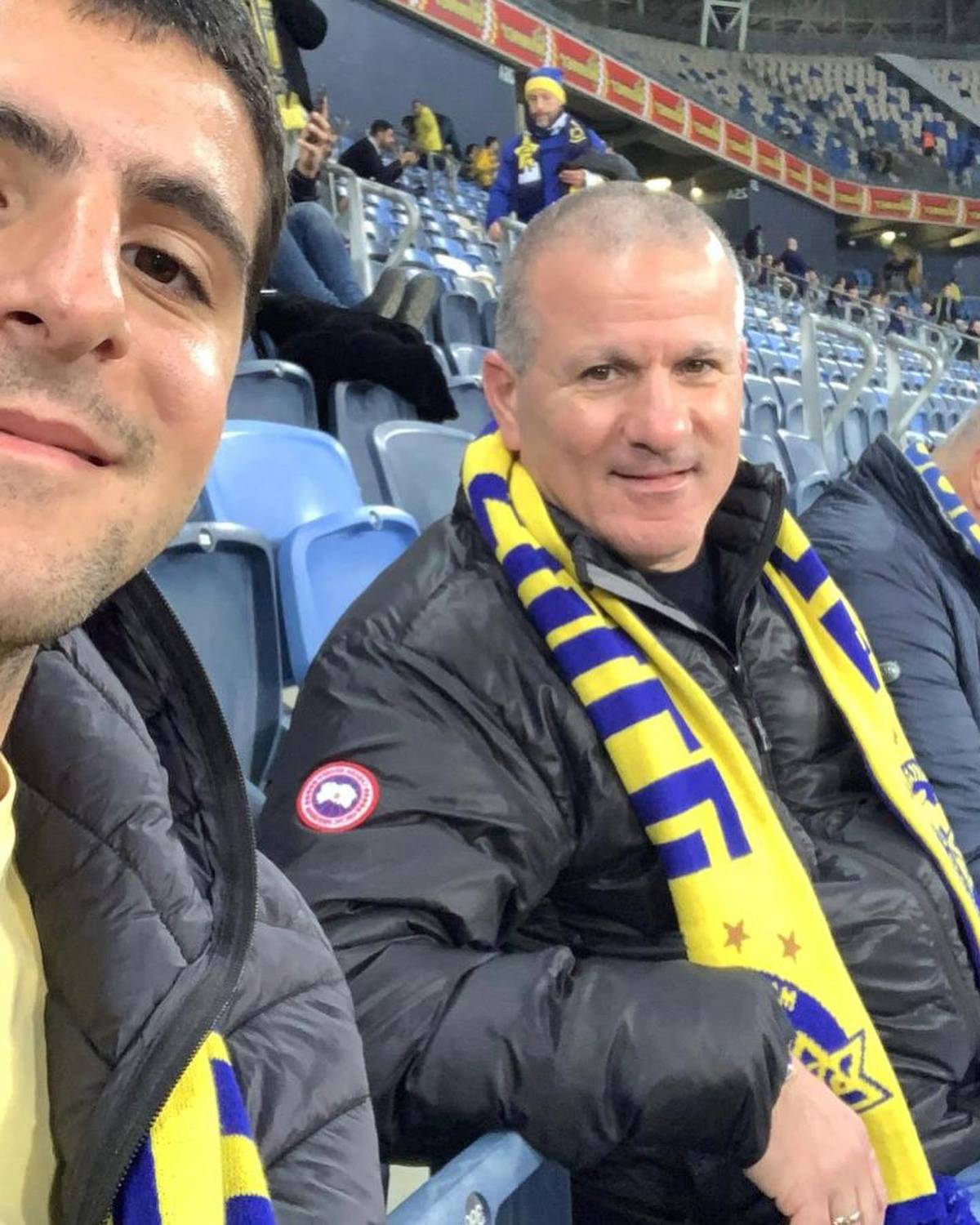 Omer Balva and dad Eyal at a Maccabi Tel Aviv soccer game in about 2021.