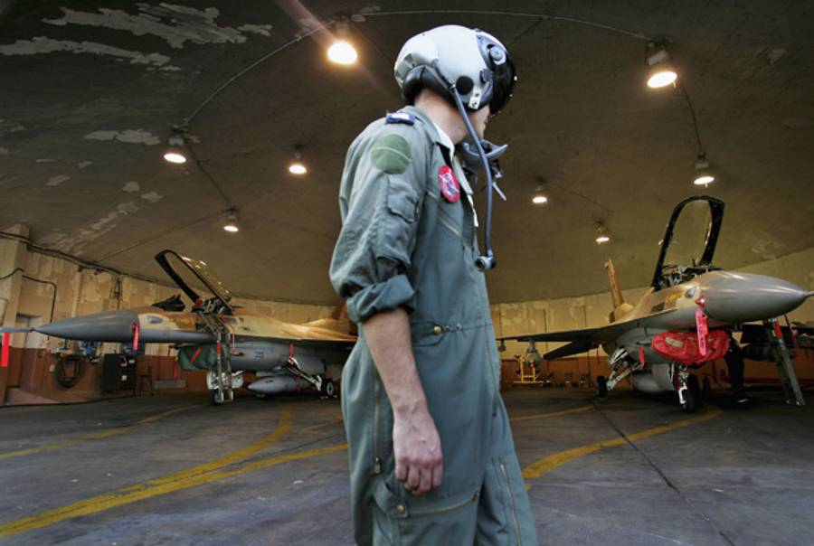 An Israeli Air Force pilot and fighter planes at Ramat David Air Base in northern Israel.(David Silverman/Getty Images)