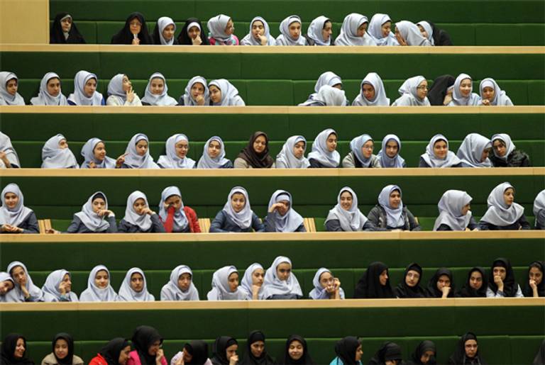 Iranian schoolgirls listening to a speech by President Mahmoud Ahmadinejad in Tehran on February 20, 2011.(Atta Kenare/AFP/Getty Images)