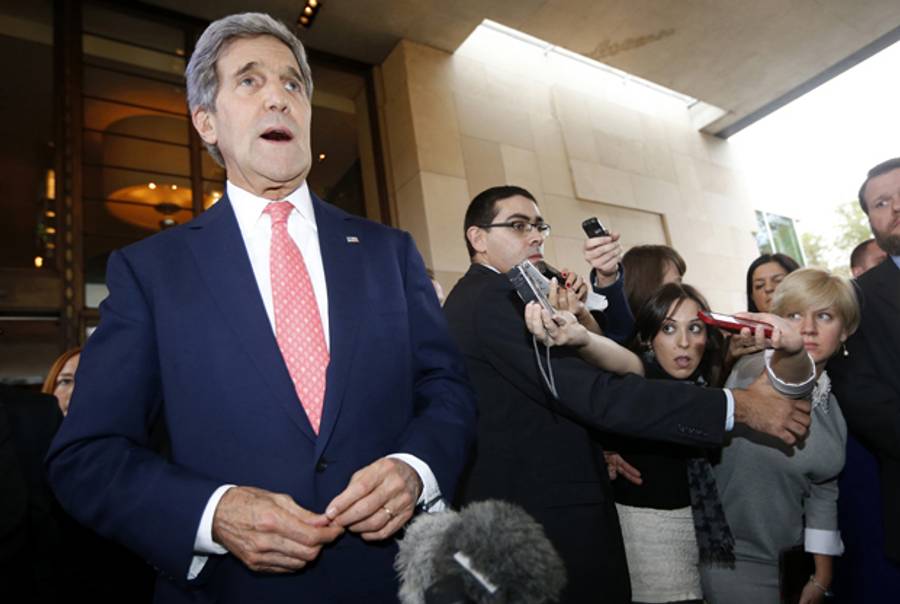 US Secretary of State John Kerry speaks to the press upon his arrival in Geneva on November 8, 2013, the second day of talks with Iran on their nuclear program. (JASON REED/AFP/Getty Images)