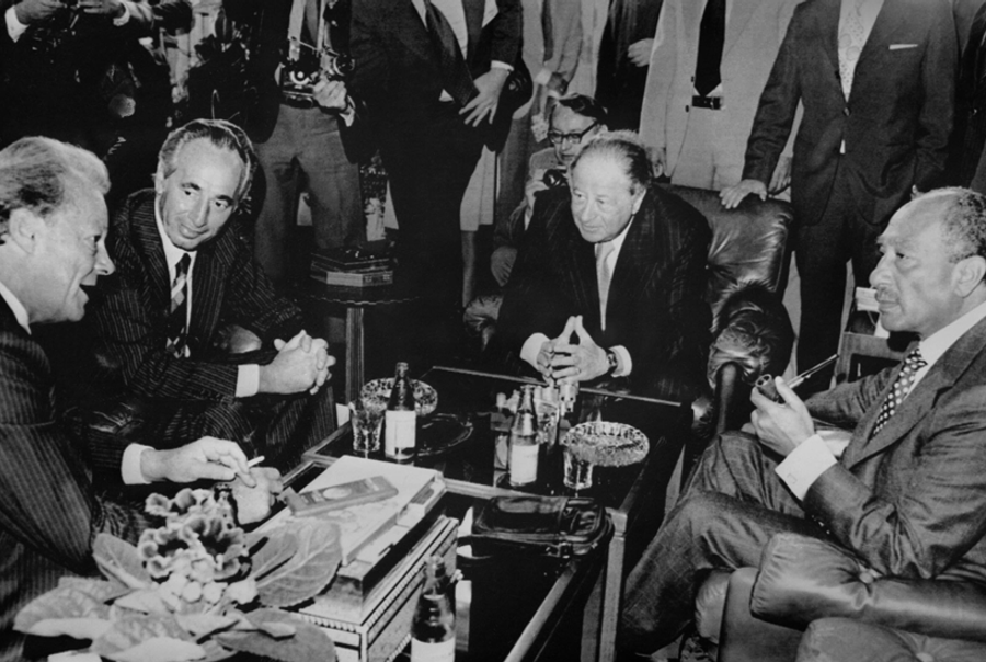 (L to R) West German social democratic leader Willy Brandt, Israeli opposition leader Shimon Peres, Austrian chancellor Bruno Kreisky and Egypt's President Anwar Sadat meet at the Vienna chancellery for unofficial talks on the Middle East situation. (AFP/Getty Images)