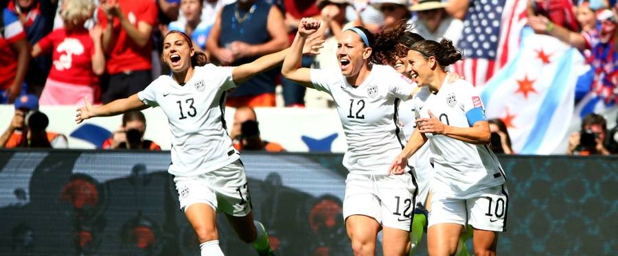 Lauren Holiday #12 and Carli Lloyd #10 of the United States celebrate after Lloyd scored her second goal against Japan in the FIFA Women's World Cup Final at BC Place Stadium in Vancouver, Canada, July 5, 2015.  (Ronald Martinez/Getty Images)