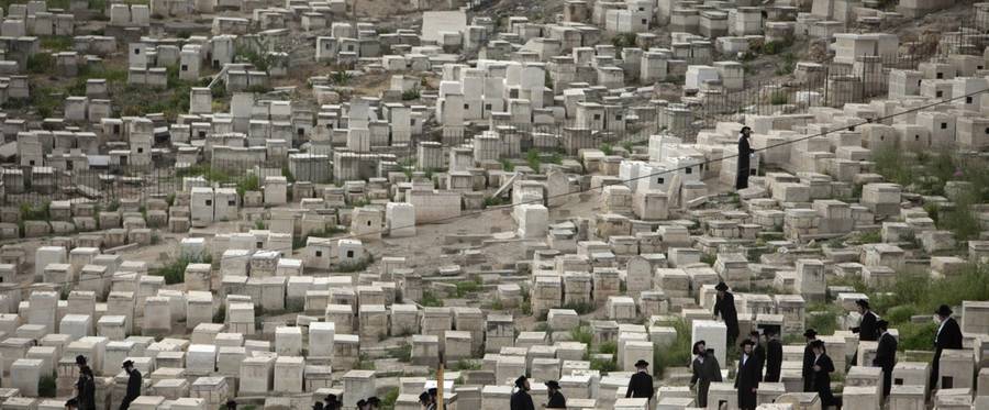 Ultra Orthodox Jews attend a funeral in the Jewish cemetery of Mount of Olives in East Jerusalem, March 11, 2010. 