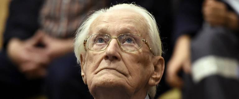 Convicted former SS officer Oskar Groening listens to the verdict of his trial in Lueneburg, Germany, July 15, 2015. 