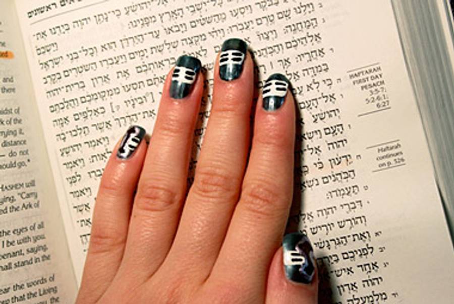 Simchat Torah nails: an unfurled Torah scroll.(Len Small/Tablet Magazine)