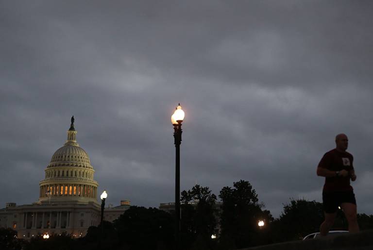A jogger runs near the U.S. Capitol on October 7, 2013 in Washington, DC. Democrats and Republicans are still at a stalemate on funding for the federal government as the shut down goes into the seventh day.(Mark Wilson/Getty Images)