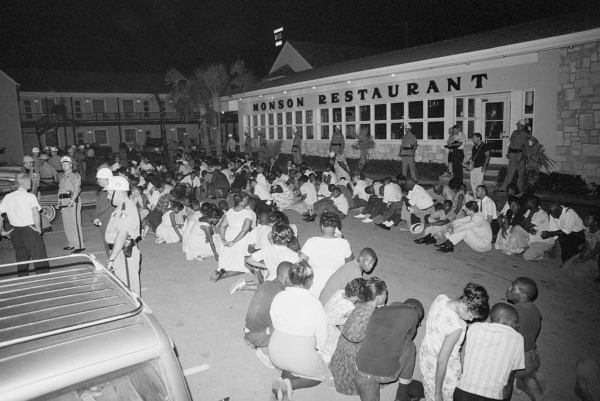  Demonstrators pray during a civil rights protest in the parking lot of the Monson Motor Lodge in Saint Augustine, Florida. (Photo: Getty Images) 