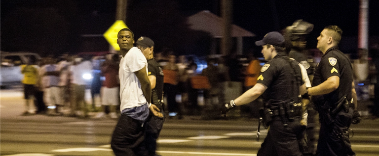 Baton Rouge police arresting a man who was participating in a protest over the Alton Sterling shooting in Baton Rouge, Louisiana, July 9, 2016. 