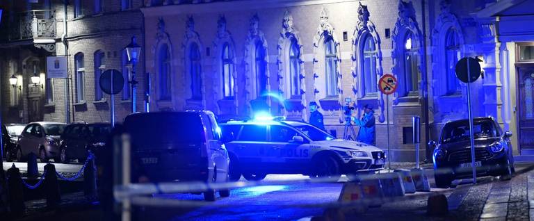 Police arrive after a synagogue was attacked in a failed arson attempt in Gothenburg, Sweden, late December 9, 2017.