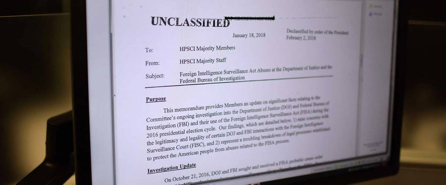 The Republican memo released by Congress is displayed on a journalist's computer screen at a newsroom in Washington DC, on February 2, 2018. The US Congress released a Republican memo alleging that the FBI abused its power to spy on President Donald Trump's election campaign.