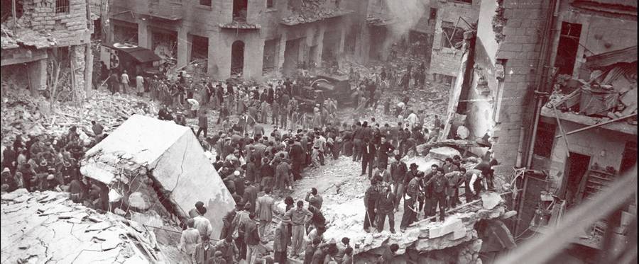 Jewish rescuers search victims among the rubble of the destroyed buildings in downtown Jerusalem March 6, 1948. 