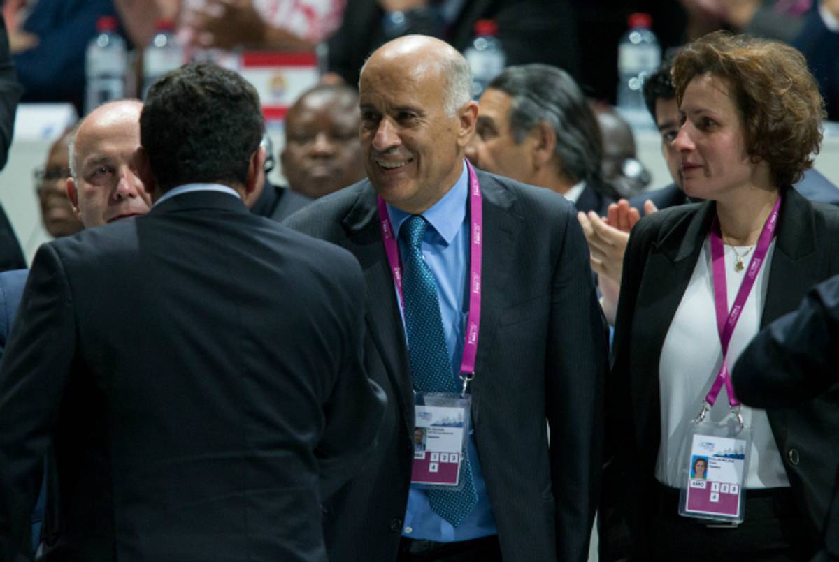 Jibril Al Rajoub (R) shakes hands with Ofer Eini during the 65th FIFA Congress in Zurich, May 29, 2015. (Philipp Schmidli/Getty Images)