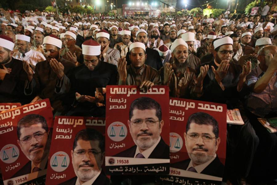 Supporters of Mohammed Morsi, the Muslim Brotherhood's candidate in Egypt's presidential election, pray during the party's last campaign rally in Cairo on May 20, 2012.(Mahmud Hams/AFP/GettyImages)
