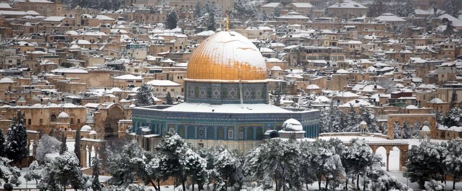 The Dome of the Rock mosque in the al-Aqsa mosque compound in the old city of Jerusalem seen following heavy snow fall on February 20, 2015.
