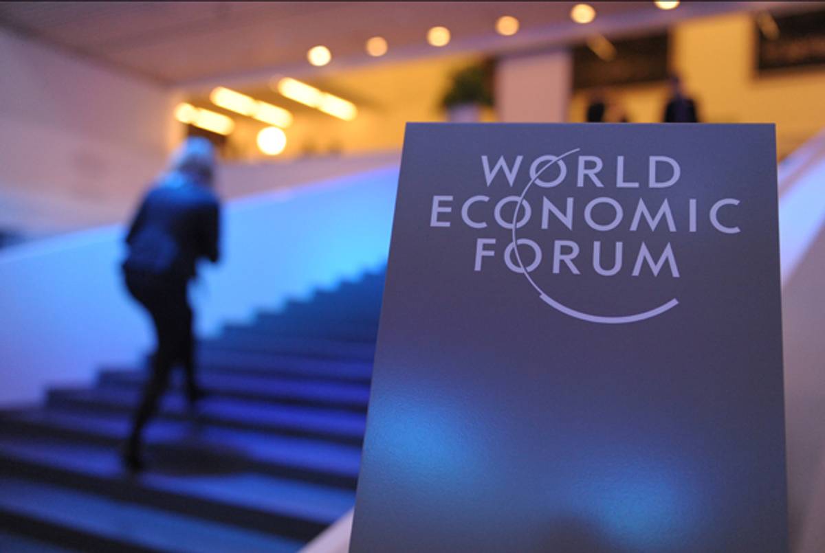 Participants arrive at the World Economic Forum in Davos on January 21, 2014.(ERIC PIERMONT/AFP/Getty Images)