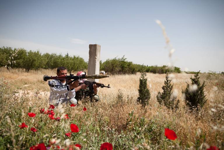 Members of the Free Syrian Army training in Qusayr, nine miles) from Homs, on May 10, 2012.(AFP/Getty Images)