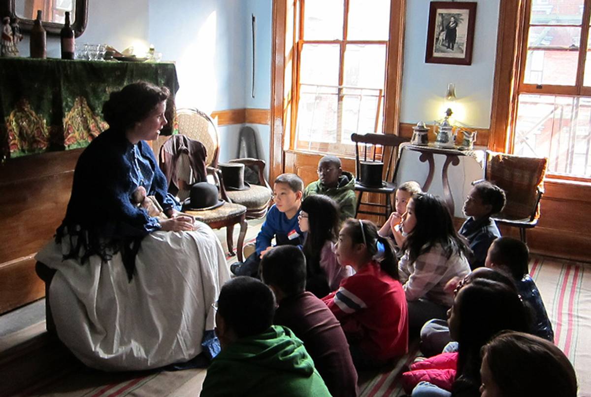 A costumed interpreter portrays Bridget Moore in a program for school groups at the Tenement Museum.(Courtesy of the Tenement Museum)