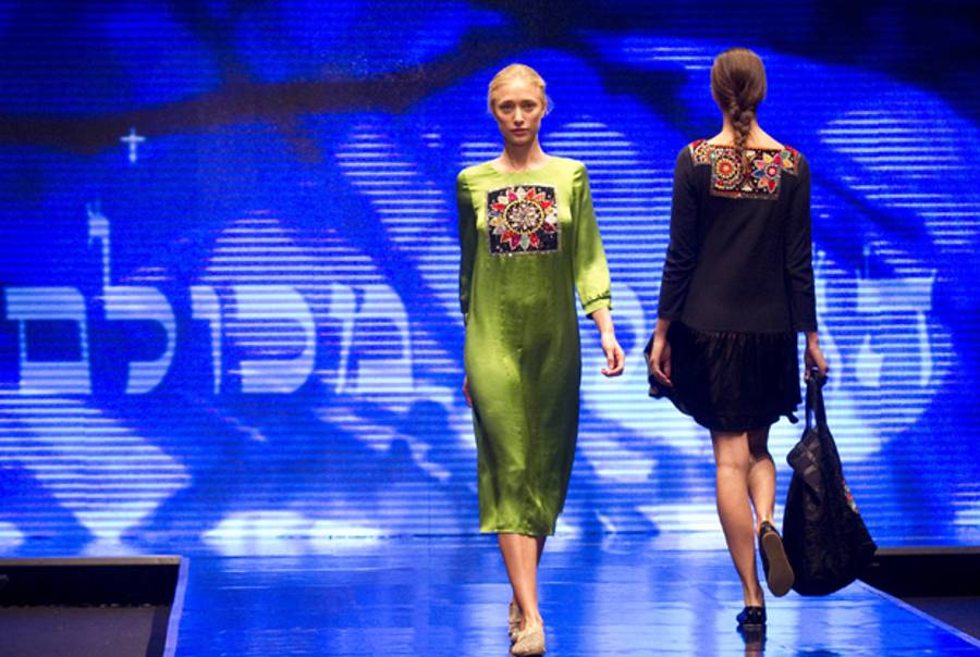 A model presents a creation by Israeli designer 'Tovale during the Tel Aviv Fashion Week on November 22, 2011 in the Israeli city of Tel Aviv. (JACK GUEZ/AFP/Getty Images)