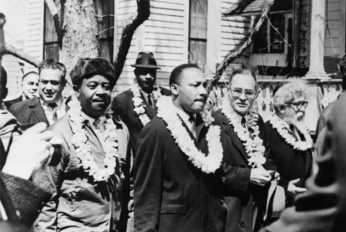 In Montgomery, Alabama, a march to campaign for proper registration of black voters, March 23, 1965. From left: Ralph Abernathy, Martin Luther King Jr., Ralph Bunche, and Rabbi Abraham Joshua Heschel. (Popperfoto/Getty Images)